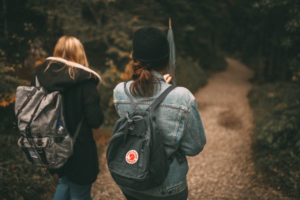 Create a health habit - Two friends walking on a path.  